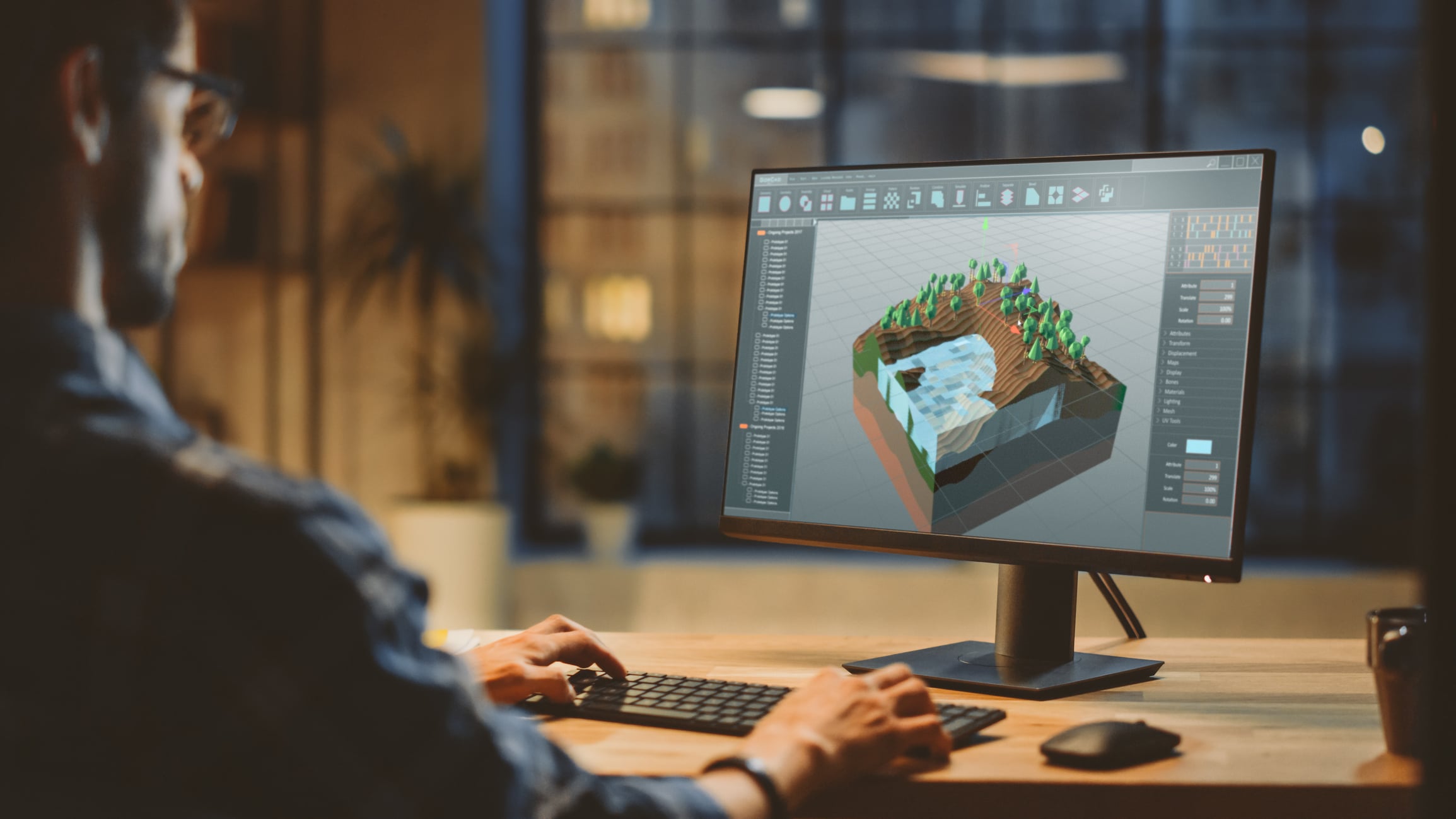 En Teknisk 3D-artist som arbetar med ett spel på datorn